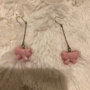 Pink bow dangling earrings